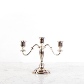 Rent Mismatched Small Brass Candlesticks